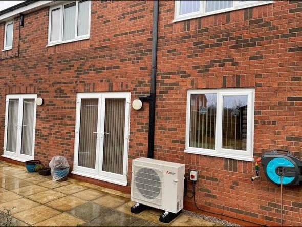 Air source heat pump and air conditioning installation at a detached property