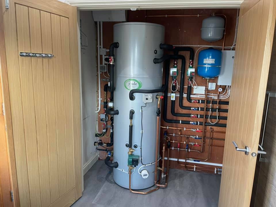 Domestic hot water cylinder installed with an air source heat pump system