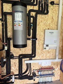 Outdoor air source heat pump unit installed by Ecoheat